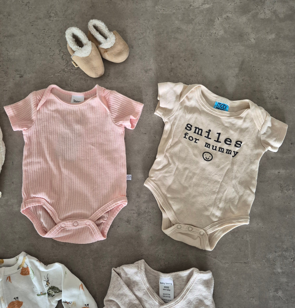 Newborn Bundle of Clothes, Booties and Bassinet Fitted Sheets